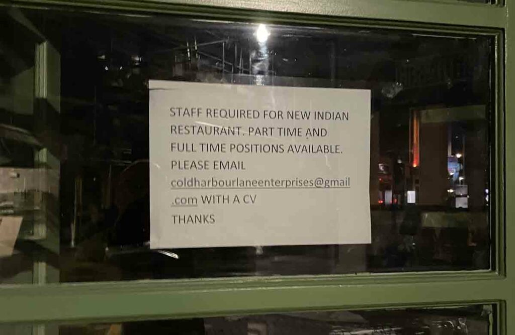 sign in window offering jobs