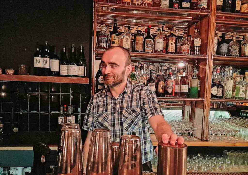 man behind cocktail bar