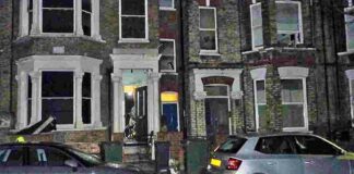 night time image of terraced houses