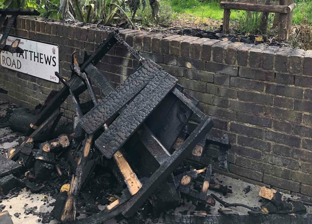 vandalised and burned wooden structure