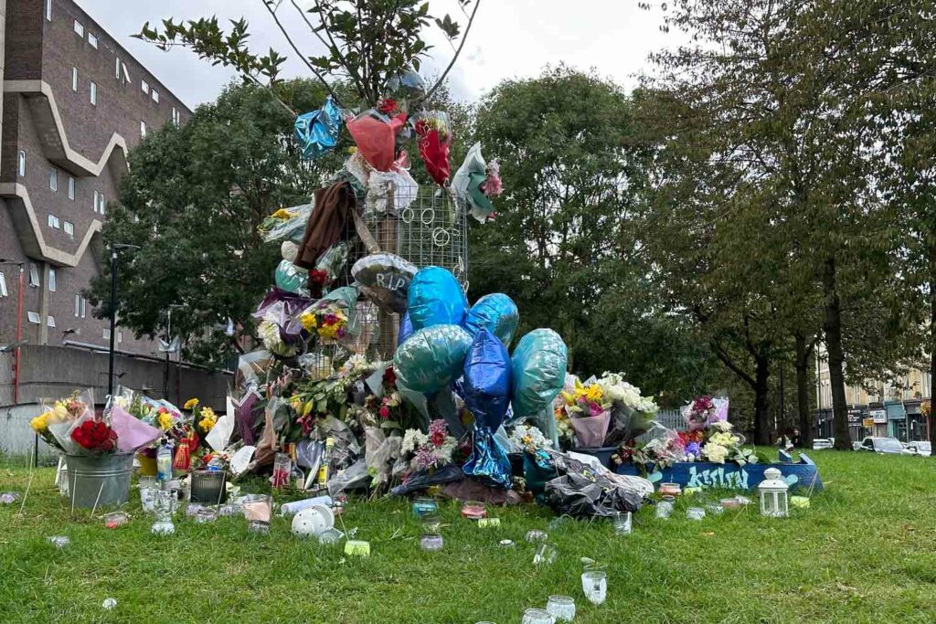 memorial with flowers and balloons