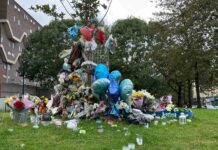 memorial with flowers and balloons