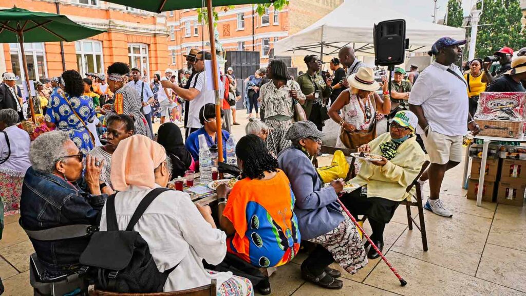 people eating at open air event