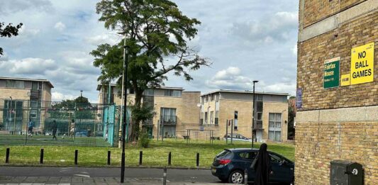 housing estate with cage football pitch