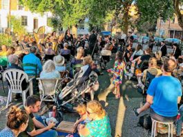 Brixton Chamber Orchestra performing opera in Brixton’s Trinity Gardens in 2022