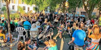 Brixton Chamber Orchestra performing opera in Brixton’s Trinity Gardens in 2022