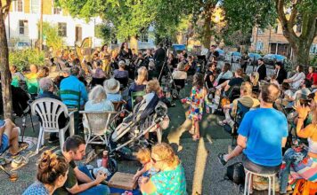 Brixton Chamber Orchestra performing opera in Brixton’s Trinity Gardens in 2022