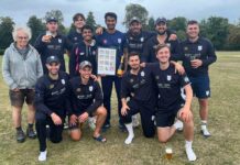 cricket team poses for photo