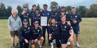 cricket team poses for photo