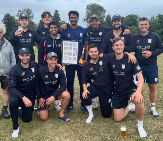 cricket team poses for photo