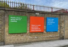 school exterior wall with signs