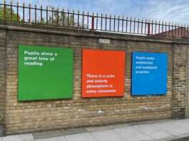 school exterior wall with signs