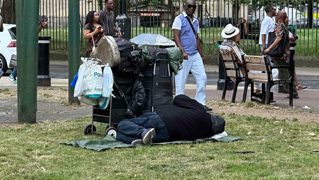 homeless person sleeping in public space