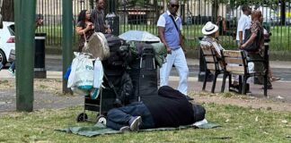 homeless person sleeping in public space