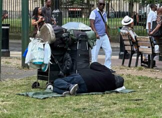 homeless person sleeping in public space