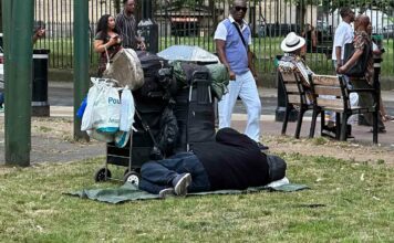 homeless person sleeping in public space