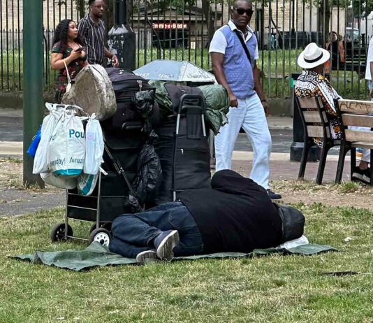 homeless person sleeping in public space