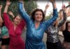 women dancing in street