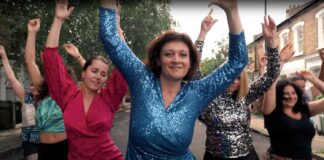 women dancing in street