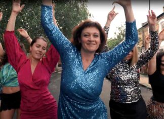 women dancing in street