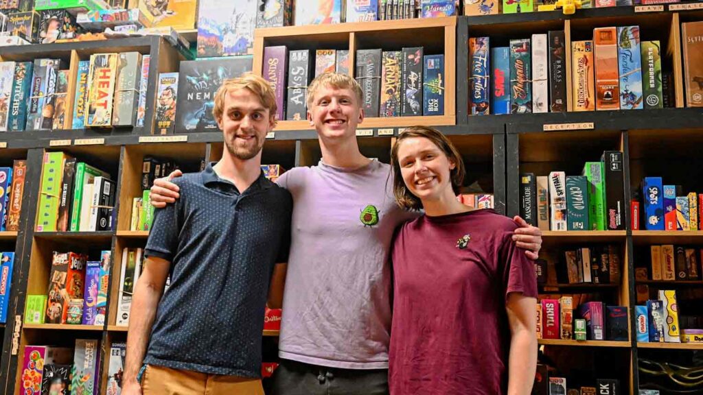 Three young people pose for photo