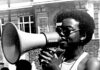 woman speaks into megaphone