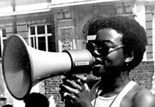 woman speaks into megaphone