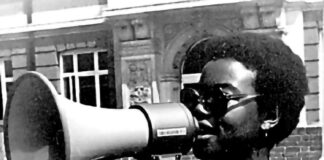 woman speaks into megaphone