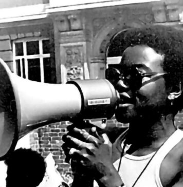 woman speaks into megaphone