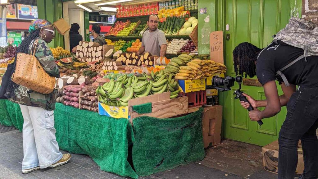 filming a market stall