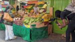 filming a market stall