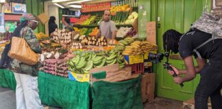 filming a market stall