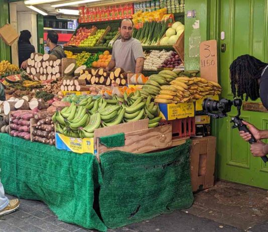 filming a market stall