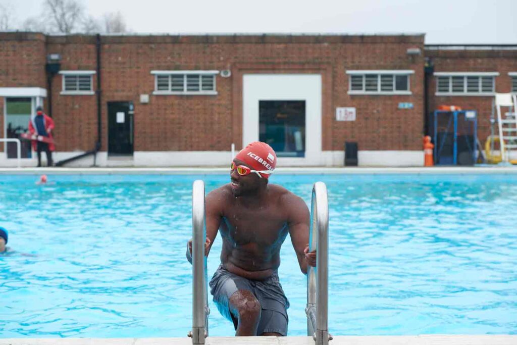 man getting out of swimming pool