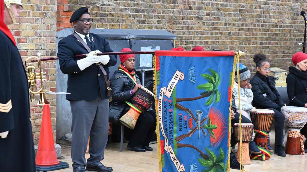 man with military banner