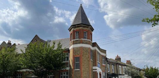 Urban building with small tower