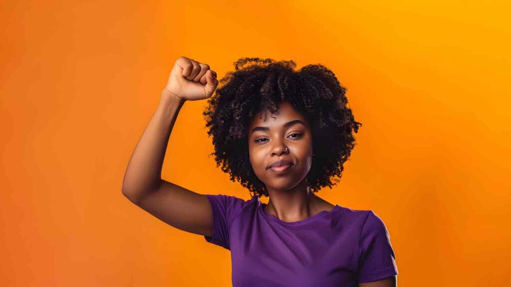 young woman raised fist