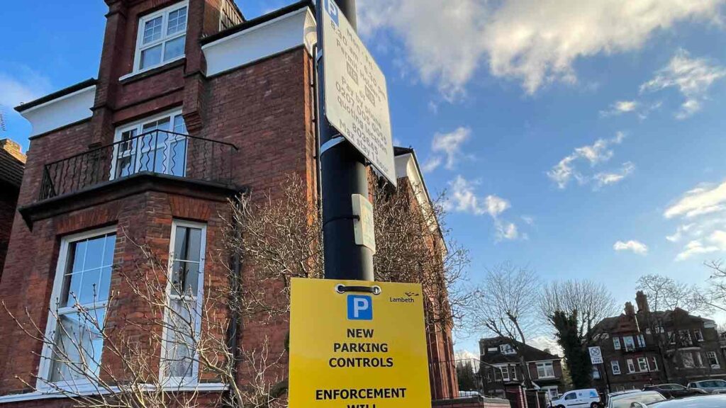 parking sign on lamppost